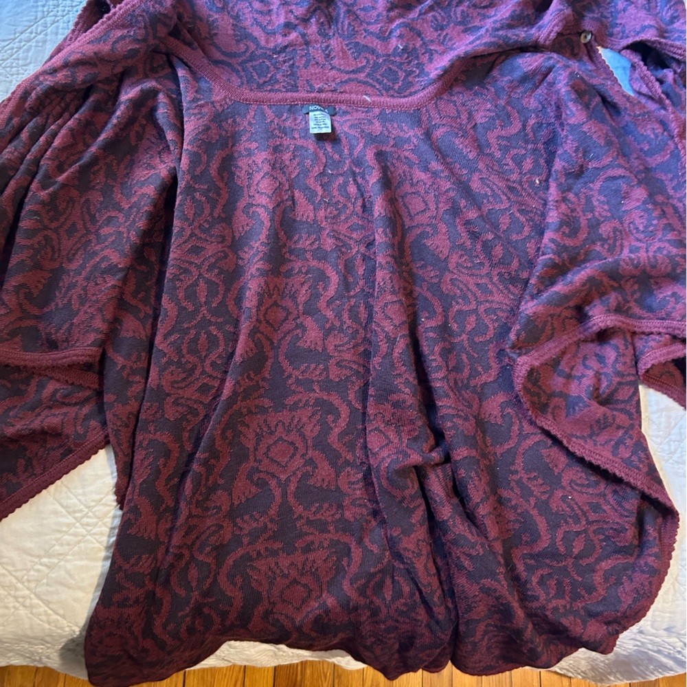 Novica Alpaca blend button front poncho with attached scarf with fringe.